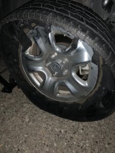 Tire blowout on left rear of a Honda CRV